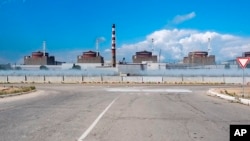 FILE - In this handout photo taken from video and released by Russian Defense Ministry Press Service on Aug. 7, 2022, a general view of the Zaporizhzhia Nuclear Power Station in territory under Russian military control, southeastern Ukraine. It is one of 