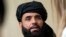 FILE - Suhail Shaheen, spokesman for the Taliban's political office in Doha, speaks to the media in Moscow, Russia on May 28, 2019.