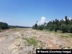 Dry spell in one of the tributaries of Jhelum in Anantnag district of Kashmir