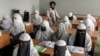 FILE - Afghan girls attend a religious school, which remained open since last year's Taliban takeover, in Kabul, Afghanistan, Aug. 11, 2022. For most teenage girls in Afghanistan, it’s been a year since they set foot in a classroom.