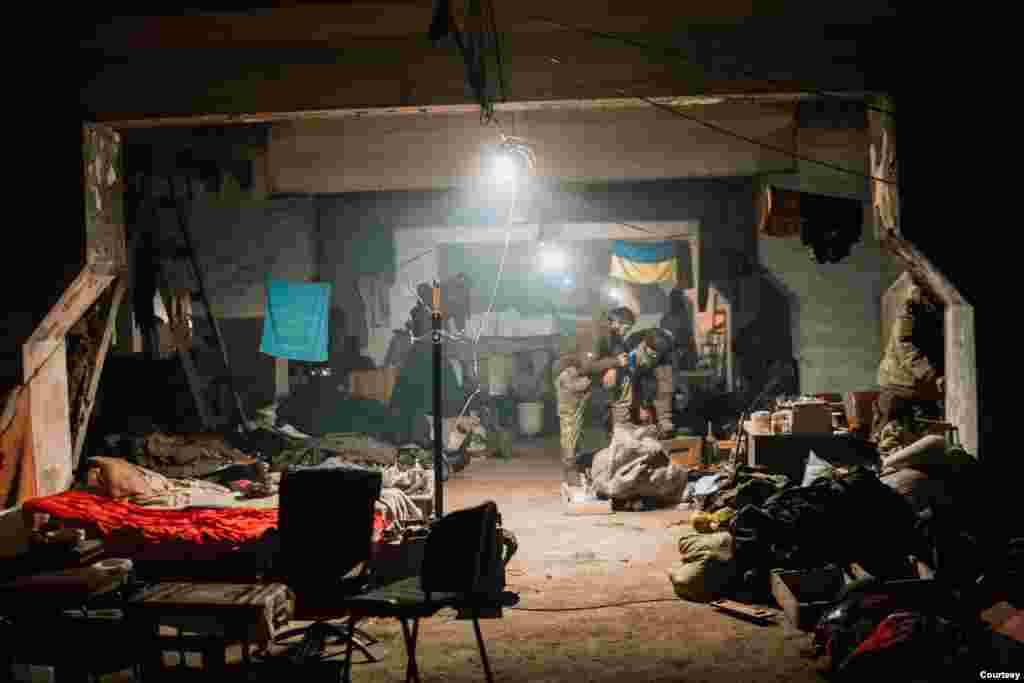 A small Ukrainian flag hangs in a bunker in Azovstal before the Russians took the steel plant. (Dmytro Kozatsky, Azov Regiment, Ukrainian National Guard)