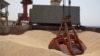 FILE - Wheat grain is seen on the MV Brave Commander vessel from Yuzhny Port in Ukraine to the drought-stricken Horn of Africa as it docks in Djibouti, Aug. 30, 2022. (Hugh Rutherford/World Food Program/Handout via Reuters)