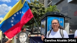 Diannet Blanco, expresa política, exige la liberación de su esposo, el activista humanitario Gabriel Blanco, detenido a principios de julio durante una manifestación en Caracas, Venezuela, el viernes, 12 de agosto de 2022.
