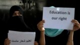 Afghan girls hold illegal protest to demand the right to education in a private home in Kabul, Afghanistan, Tuesday, Aug. 2, 2022. (AP Photo/Ebrahim Noroozi)