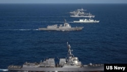 美国、日本和韩国军舰2022年8月12日参与导弹防御系统演习。（美国海军照片）