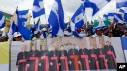 FILE - Anti-government demonstrators during a march supporting the Catholic Church, in Managua, Nicaragua, July 28, 2018. (AP Photo/Alfredo Zuniga, File)