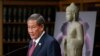 Surrounded by Cambodian antiquities, Cambodian ambassador to the United States Keo Chhea speaks during a news conference in New York, Monday, Aug. 8, 2022. (AP Photo/Seth Wenig)