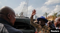 Kenya's opposition leader Raila Odinga of the Azimio La Umoja (Declaration of Unity) One Kenya Alliance, who competed in Kenya's presidential election, gestures, after addressing the nation following the announcement of the results of the presidential ele