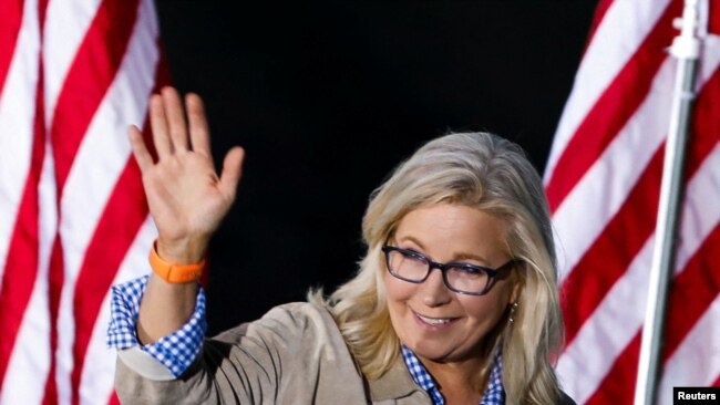 Republican candidate U.S. Representative Liz Cheney waves during her primary election night party in Jackson, Wyoming, U.S. August 16, 2022.