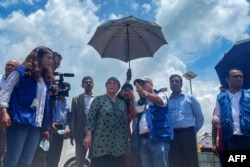 United Nations High Commissioner for Human Rights Michelle Bachelet (C) visits a Rohingya refugee camp in Ukhia on Aug. 16, 2022.