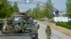 资料照片：在俄罗斯军事控制下的乌克兰东南部扎波罗热地区，一支俄罗斯军车队正在前往扎波罗热核电站的路上。(2022年5月1日)