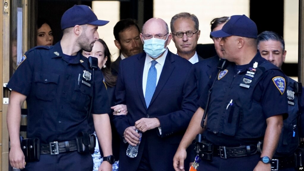 The Trump Organization's former Chief Financial Officer Allen Weisselberg, center, leaves court, in New York, Aug. 18, 2022.