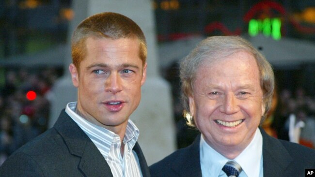 FILE - Actor Brad Pitt, left, and German director Wolfgang Petersen appear at the world premiere of the film