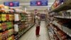 FILE - A shopper is seen at a branch of South African retailer Pick n Pay in Johannesburg on October 20, 2010. 
