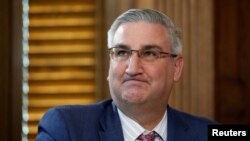 FILE - Indiana Governor Eric Holcomb in Ottawa, Ontario, Canada, March 26, 2018.