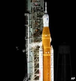 NASA's Space Launch System (SLS) rocket with the Orion spacecraft aboard is seen atop the mobile launcher at Launch Pad 39B, Monday, Aug. 29, 2022. (Joel Kowsky/NASA via AP)