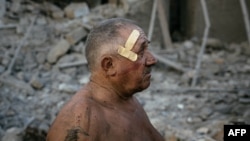 Oleksandr Shulga looks at his destroyed house following a missile strike in Mykolaiv Aug. 29, 2022. Ukrainian forces have begun a counterattack to retake the southern city of Kherson, which is currently occupied by Russian troops, a local government offic