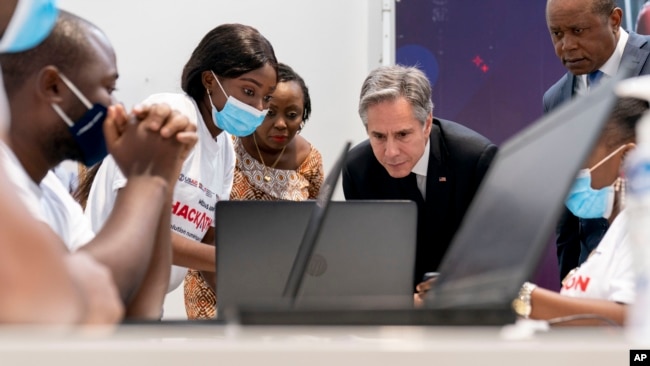 FILE - Secretary of State Antony Blinken visits an election transparency hackathon event at the Kinshasa Digital Academy in Kinshasa, Congo, Aug. 10, 2022, prior to traveling to Rwanda.