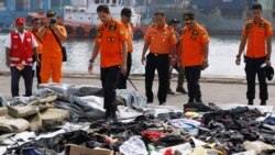 VOA Asia – Searching for survivors and clues at Indonesian jet crash