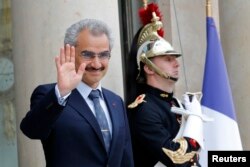 FILE - Saudi Arabian Prince Al-Waleed bin Talal arrives at the Elysee palace in Paris, to attend a meeting with the French president, Sept. 8 , 2016.