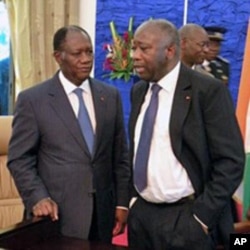 Laurent Gbagbo tare da Alassane Ouattara lokacin wata ganawarsu kafin zabe