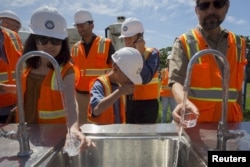 Tasting recycled wastewater at the Edward C. Little Water Recycling Facility in El Segundo, CA, July 11, 2015. Orange County's wastewater treatment program is more than twice the size, while the Metropolitan Water District's plan would eclipse even that.