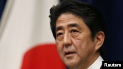 Japan's Prime Minister Shinzo Abe attends a news conference at his official residence in Tokyo, December 26, 2012.