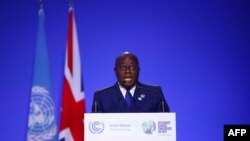 Presiden Ghana Nana Akufo-Addo menyampaikan pernyataan nasional mereka dalam KTT Iklim PBB (COP26) di Glasgow, Skotlandia, 2 November 2021. (HANNAH MCKAY / POOL / AFP)