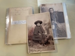 This July 8, 2021 image of photographs archived at the Center for Southwest Research at the University of New Mexico in Albuquerque, New Mexico, shows Indigenous students who attended the Ramona Industrial School in Santa Fe. (AP Photo/Susan Montoya Bryan