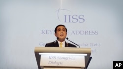 Thailand's Prime Minister Prayuth Chan-ocha delivers the keynote address at the Opening Dinner of the 15th International Institute for Strategic Studies Shangri-la Dialogue, or IISS, Asia Security Summit on June 3, 2016, in Singapore. 