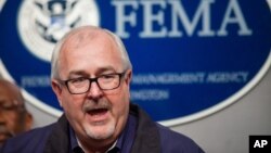 FILE – Then-Federal Emergency Management Agency Administrator Craig Fugate speaks at FEMA headquarters in Washington, Feb. 26, 2015. 