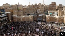 Shiite rebels known as Houthis gather to protest against Saudi-led airstrikes, during a rally in Sanaa, Yemen, April 1, 2015.