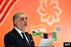 FILE - Afghanistan Chief Executive Officer Abdullah Abdullah delivers the keynote address at the US-sponsored trade and investment initiative 'Passage To Prosperity' in the Indian capital in New Delhi on Sept. 28, 2017.