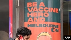 Një poster në Melburn ku inkurajohet vaksinimi