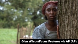 This image released by Focus Features shows Cynthia Erivo as Harriet Tubman in a scene from "Harriet," a film that will be featured during the Toronto Film Festival. 