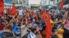 Bangladeshi garment workers and their supporters hold a rally in Dhaka, Sept. 14, 2018, to demand a higher monthly minimum wage.