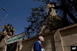 A Christian man who fled el-Arish stands outside the Evangelical Church in Ismailia, 120 kilometers (75 miles) east of Cairo, Egypt, Sunday, Feb. 26, 2017.