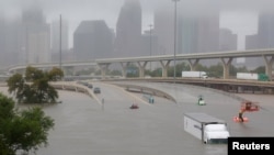 FILE - Interstate highway 45 is submerged from the effects of Hurricane Harvey seen during widespread flooding in Houston, Texas, Aug. 27, 2017.
