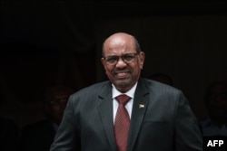 FILE - Sudan's President Omar al-Bashir prepares make a speech opening the Djibouti International Free Trade Zone in Djibouti on July 5, 2018.