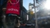 An advertisement for "RedNote," a Chinese social media app, is seen as people walk by the Nasdaq headquarters in Times Square, Jan. 27, 2025 in New York City. 