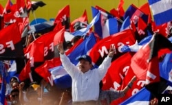 FILE - Nicaraguan President Daniel Ortega arrives to a rally marking the 39th anniversary of the Sandinista victory ousting the Somoza dictatorship. (AP Photo/Alfredo Zuniga, File)