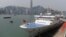 FILE - China's Yuan Wang 6 satellite tracking ship is seen docked with Hong Kong behind it, April 29, 2009. Beijing has been planning to dispatch the similar Yuan Wang 5 to Sri Lanka. 