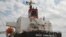 The bulk carrier Brave Commander is seen during loading with wheat for Ethiopia, amid Russia's war on Ukraine, in the sea port of Yuzhne, Odesa region, Ukraine, Aug. 14, 2022.