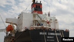 FILE: The bulk carrier Brave Commander is seen during loading with wheat for Ethiopia, amid Russia's war on Ukraine, in the sea port of Yuzhne, Odesa region, Ukraine, Aug. 14, 2022.