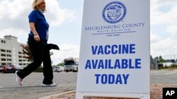 A Mecklenburg County Public Health employee arrives at a monkeypox vaccine clinic in Charlotte, North Carolina, Aug. 20, 2022.
