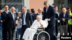 FILE - Pope Francis greets faithful during his visit in L'Aquila, Italy, Aug. 28, 2022.