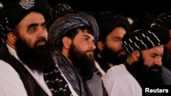 FILE - Afghan Taliban's acting Minister of Defense Mullah Mohammad Yaqoob attends the first-anniversary ceremony of the takeover of Kabul by the Taliban in Kabul, Aug. 15, 2022