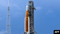 FILE - The Artemis I unmanned lunar rocket sits on the launch pad at the Kennedy Space Center in Cape Canaveral, Florida, Aug. 26, 2022, ahead of its expected launch on August 29. 