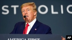 FILE - Former President Donald Trump speaks at an America First Policy Institute agenda summit at the Marriott Marquis in Washington, July 26, 2022. 