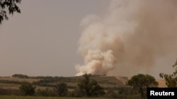 Smoke rises following recent Russian shelling, as Russia's attack in Ukraine continues, in Pazeno area, in Donetsk region, Ukraine August 28,2022. 